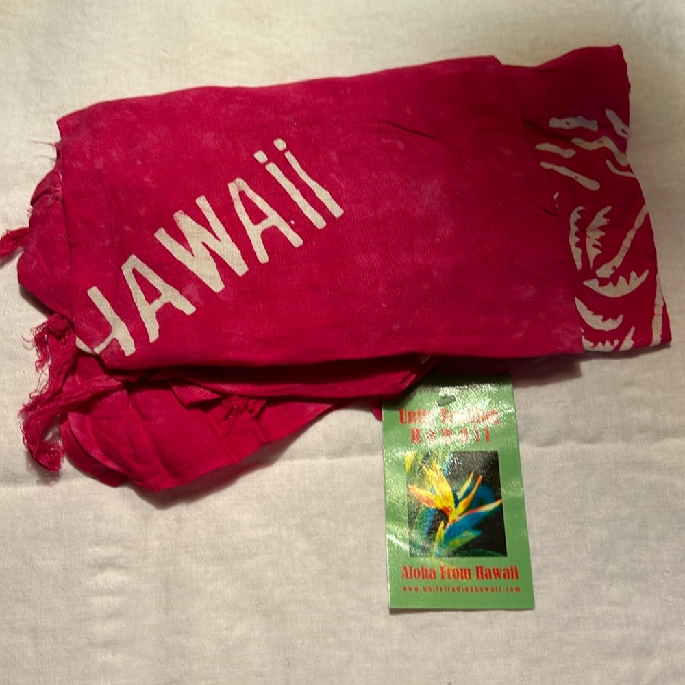 NWT this is a fun summer sarong from Unity Trading Hawaii in bright fuchsia.
